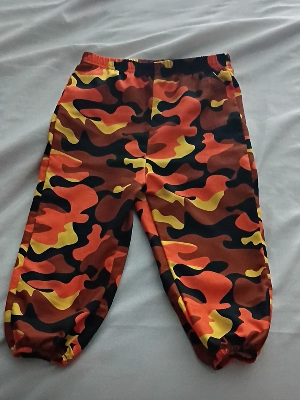 SHEIN Kids Orange Yellow & Black Camo Joggers